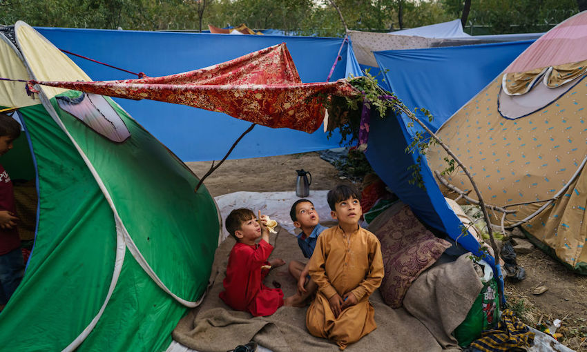 AFGHANS FLEEING FIGHTING OUTSIDE KABUL